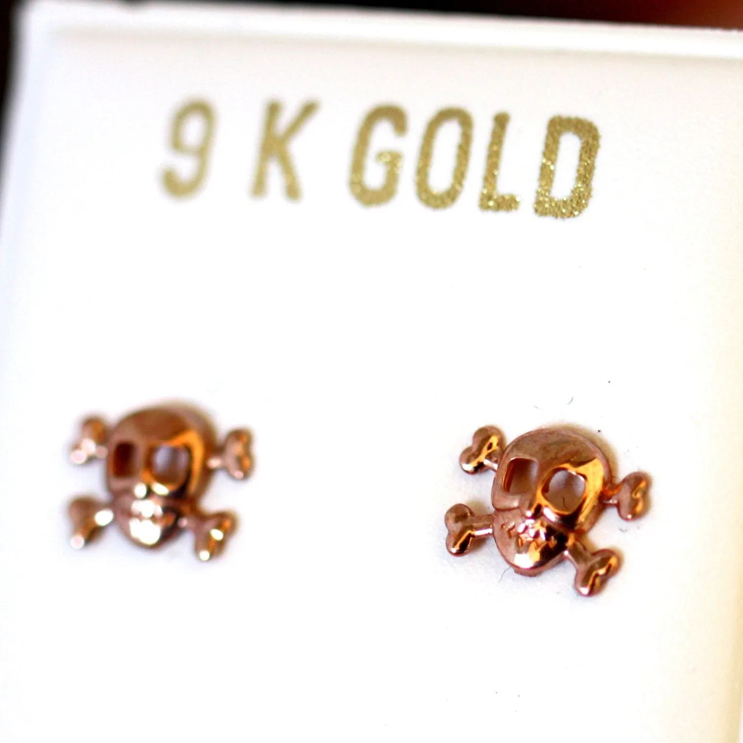Rose gold skull Halloween earrings